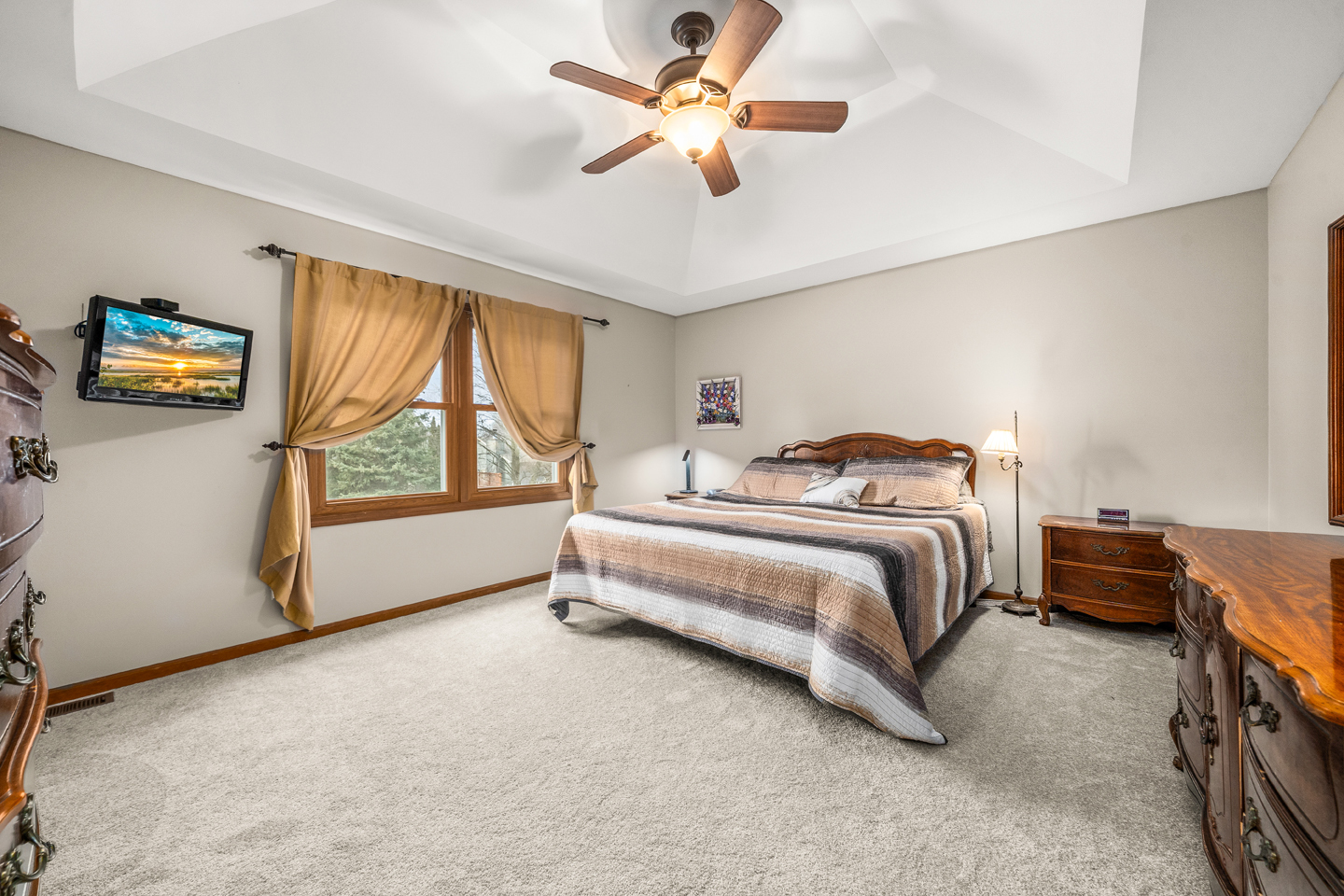 540 Parkside Drive Elburn, IL 60119 - Photo 21 of 38 a spacious bedroom with a bed and a window