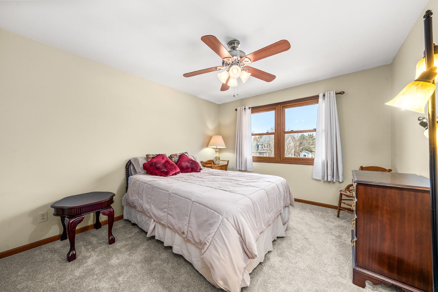 540 Parkside Drive Elburn, IL 60119 - Photo 25 of 38 a bedroom with a bed and a chandelier