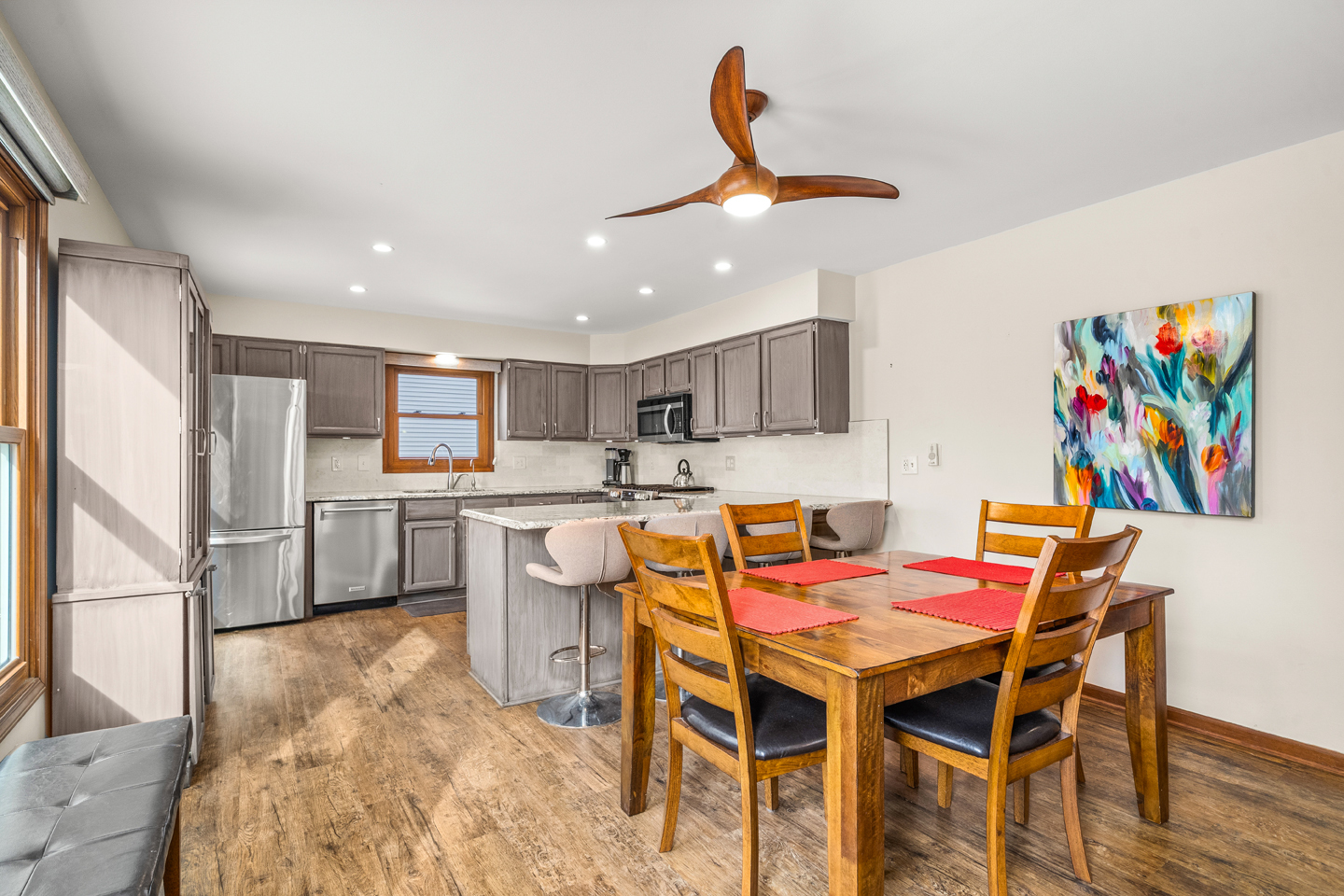 540 Parkside Drive Elburn, IL 60119 - Photo 10 of 38 a outdoor kitchen with white cabinets and stainless steel appliances