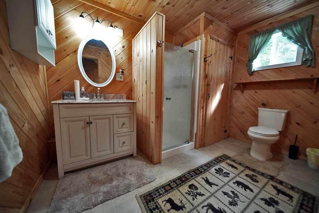 387 Boulder Road Danforth, ME 04424 - Photo 33 of 79 lake-bathroom-grand
