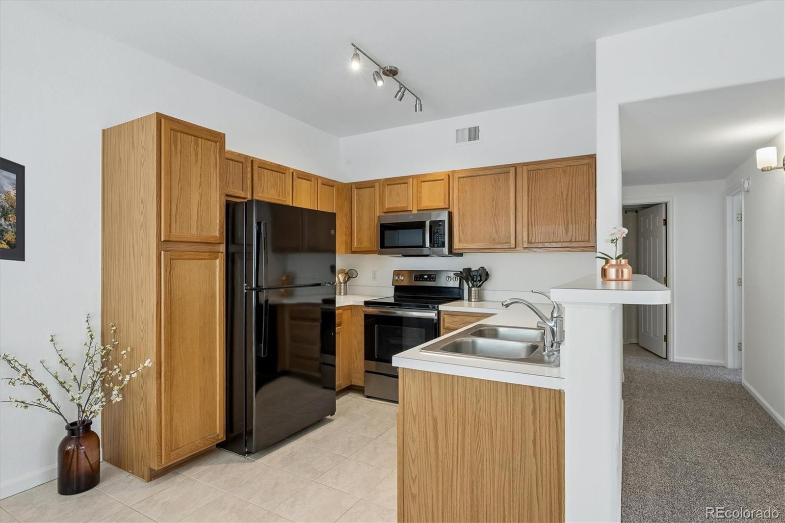 8437 South Thunder Ridge Way, Unit 103 Highlands Ranch, CO 80126 - Photo 10 of 25