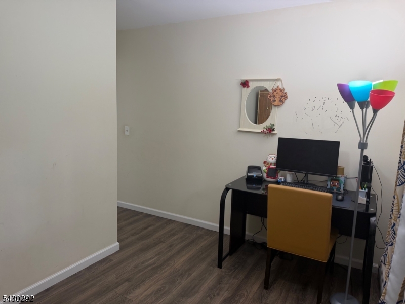 775 Tabor Road Morris Plains, NJ 07950 - Photo 10 of 21 a view of a workspace with furniture and wooden floor