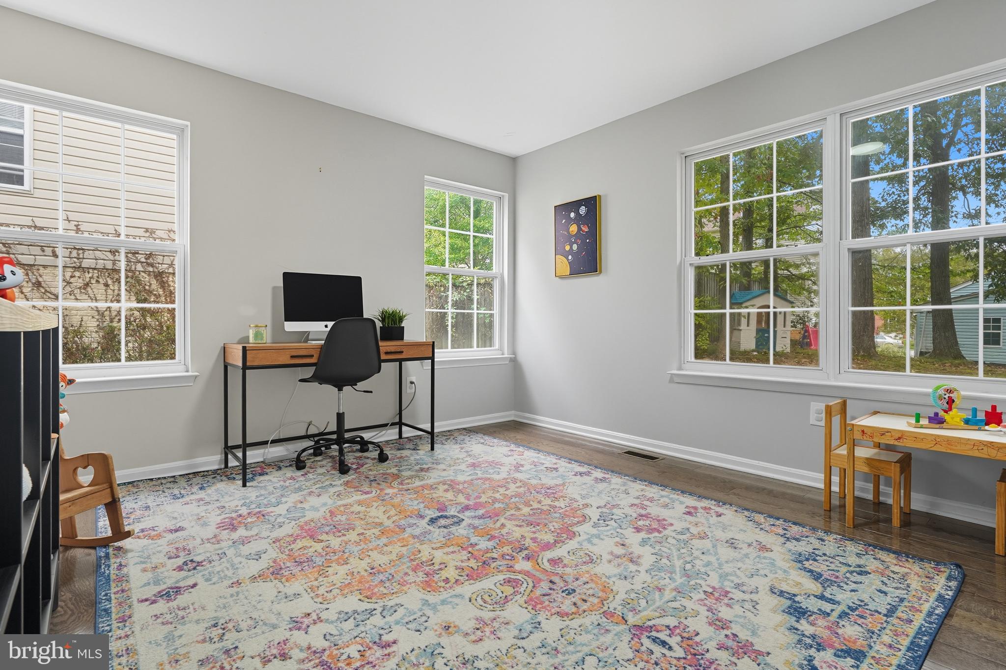 3100 Hillside Avenue Cheverly, MD 20785 - Photo 16 of 58 a view of a workspace with furniture and a window