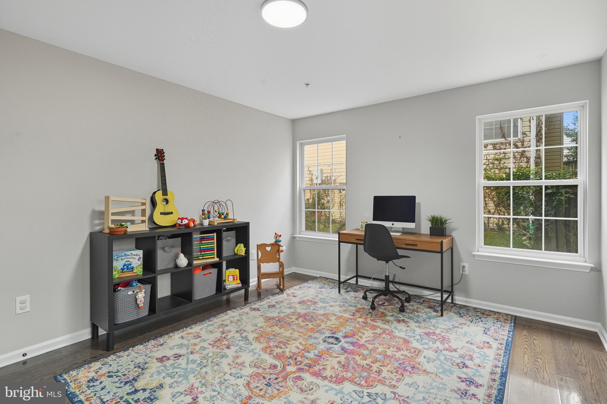 3100 Hillside Avenue Cheverly, MD 20785 - Photo 17 of 58 a view of a workspace with furniture and a window