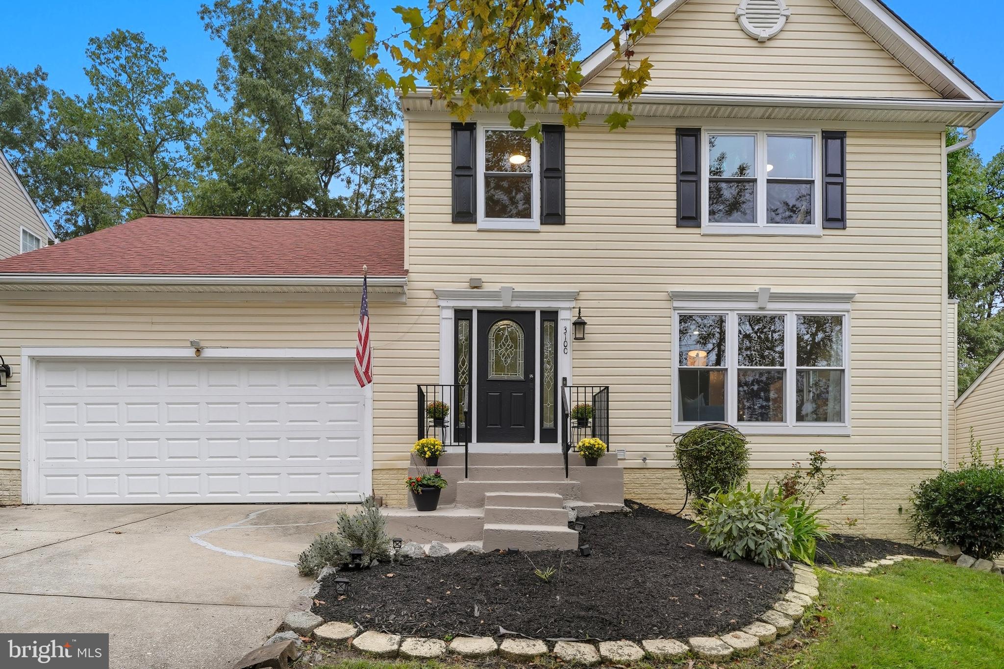 3100 Hillside Avenue Cheverly, MD 20785 - Photo 3 of 58 a front view of a house with garden