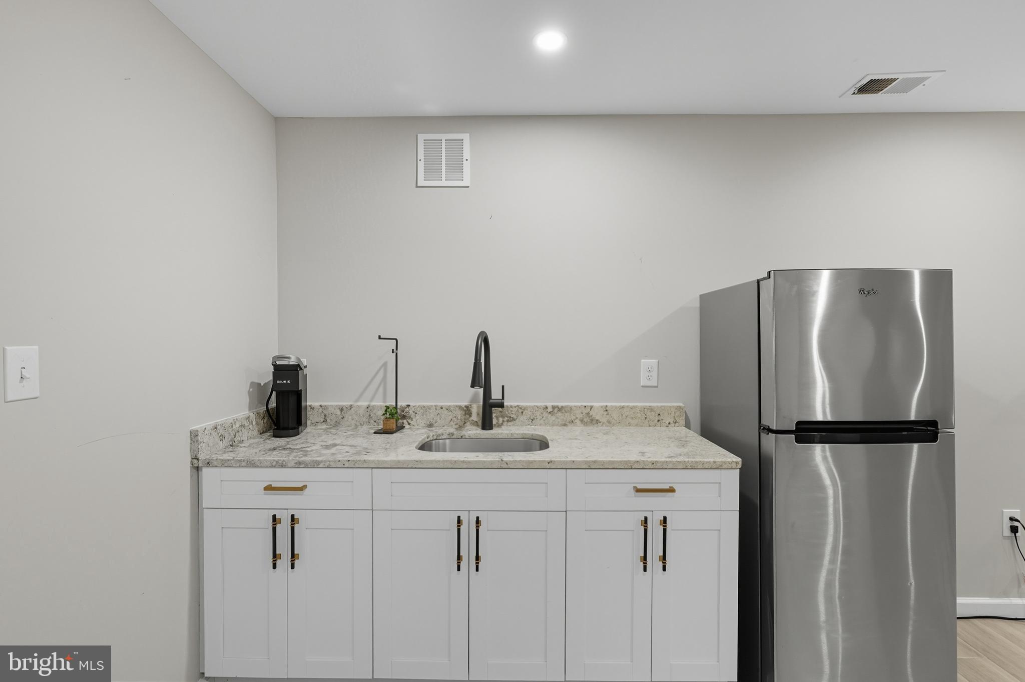 3100 Hillside Avenue Cheverly, MD 20785 - Photo 36 of 58 a bathroom with a sink and a mirror