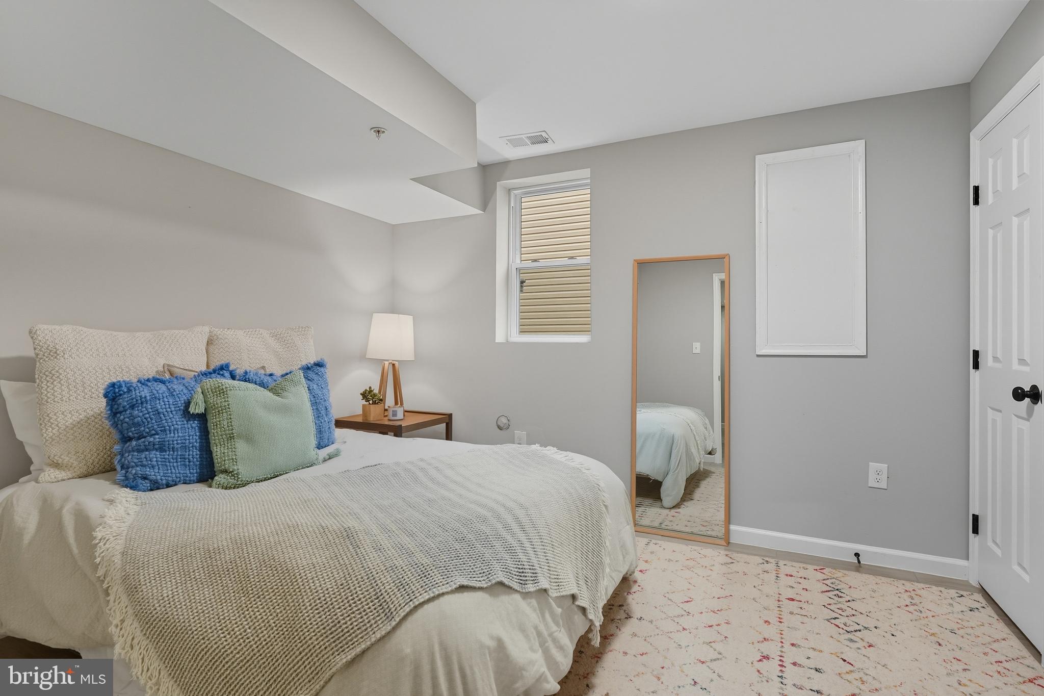 3100 Hillside Avenue Cheverly, MD 20785 - Photo 39 of 58 a bedroom with a bed and a window