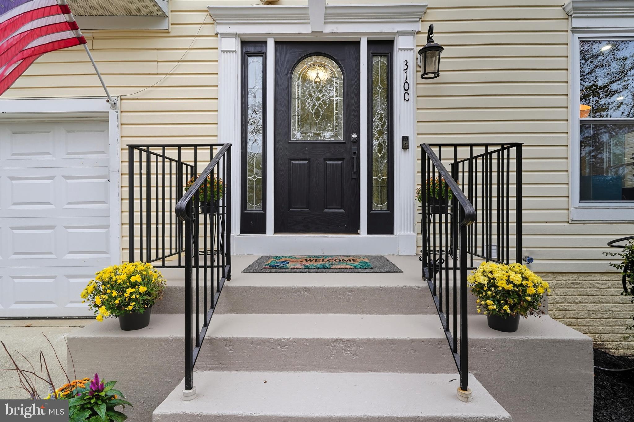 3100 Hillside Avenue Cheverly, MD 20785 - Photo 4 of 58 a front view of a house with a garden