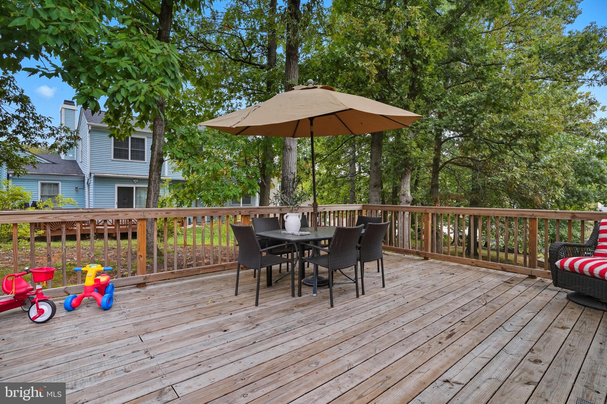 3100 Hillside Avenue Cheverly, MD 20785 - Photo 43 of 58 a view of a chairs and table on the wooden deck