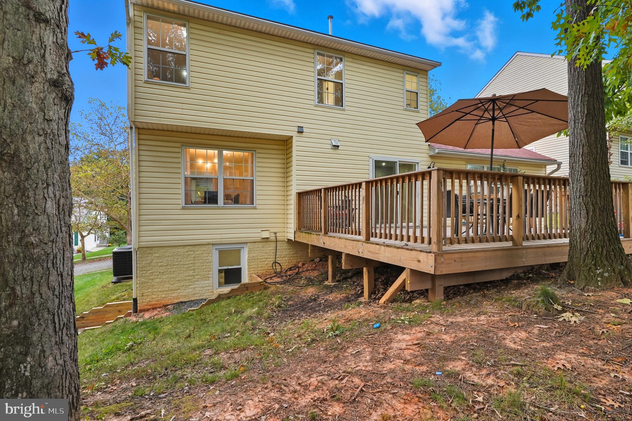 3100 Hillside Avenue Cheverly, MD 20785 - Photo 49 of 58 a view of a house with a yard and sitting area