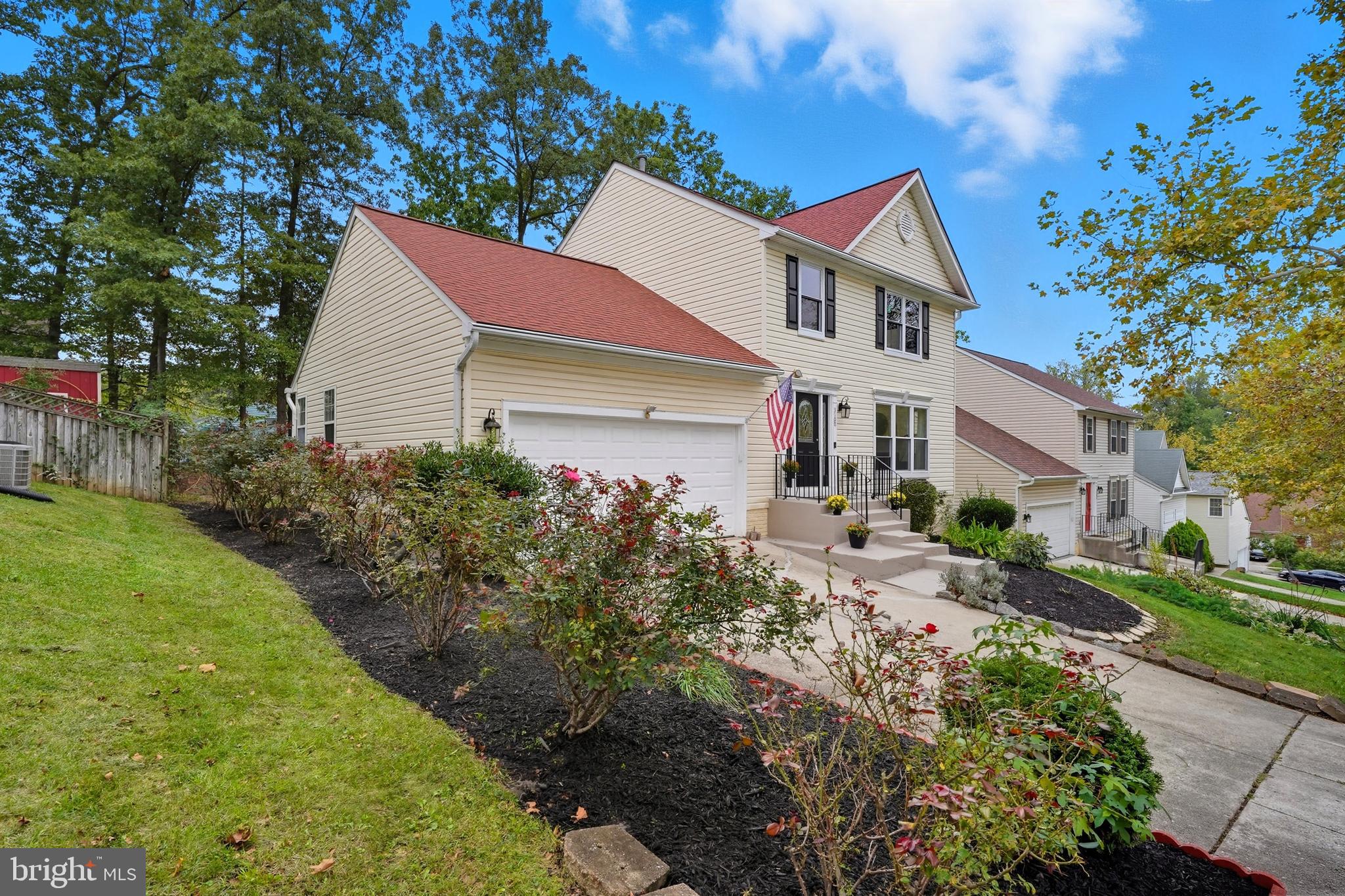 3100 Hillside Avenue Cheverly, MD 20785 - Photo 52 of 58 a front view of a house with a yard and outdoor seating
