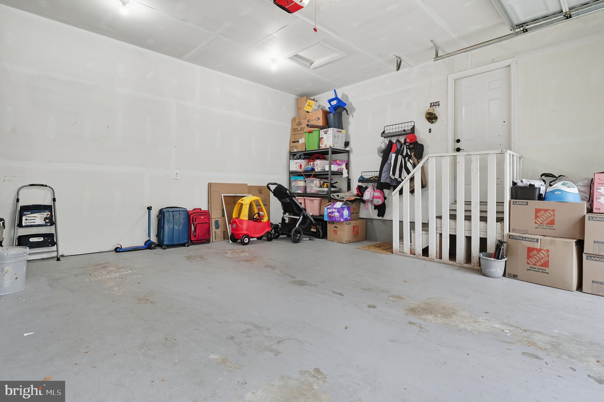 3100 Hillside Avenue Cheverly, MD 20785 - Photo 54 of 58 a view of a garage with toys and a chandelier