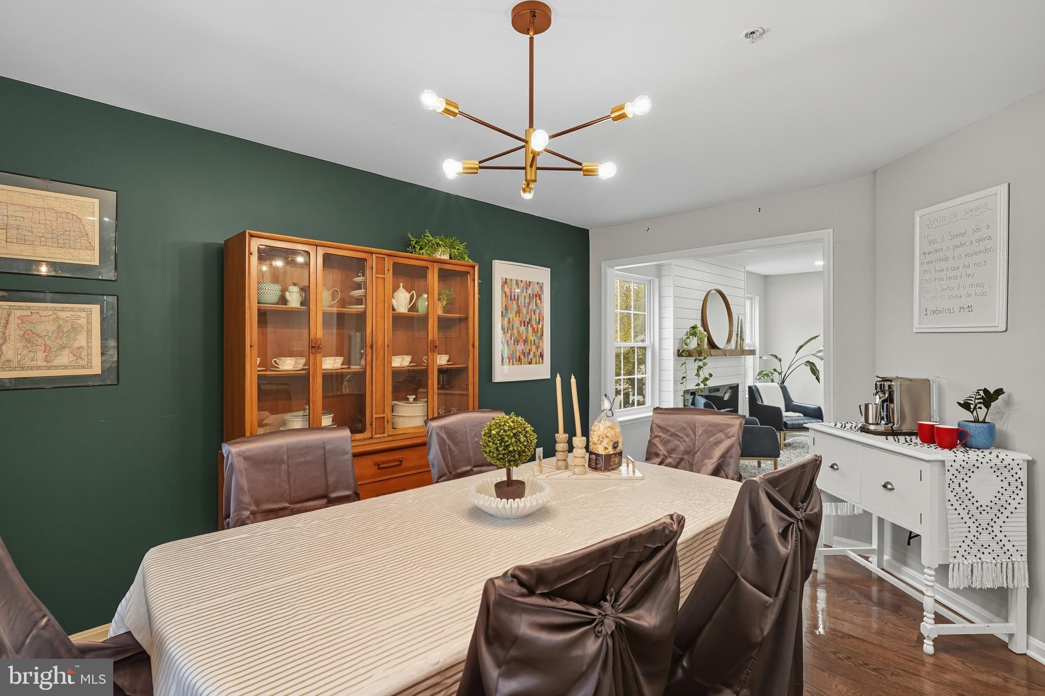 3100 Hillside Avenue Cheverly, MD 20785 - Photo 10 of 58 a view of a dining room with furniture large window and wooden floor