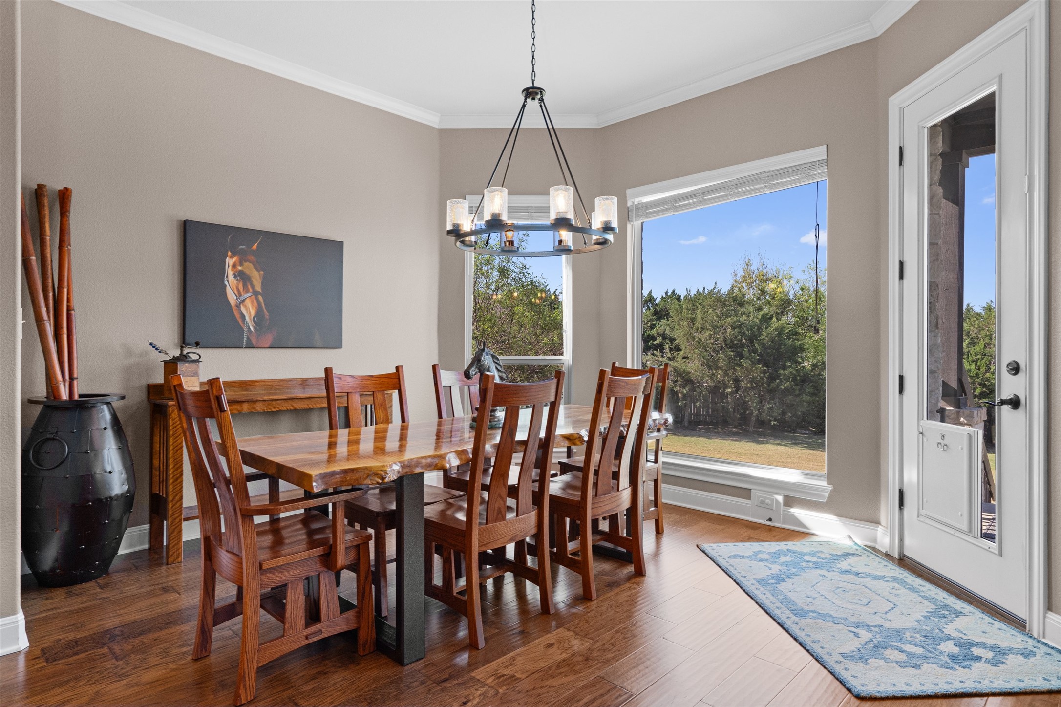 164 Milestone Road Liberty Hill, TX 78642 - Photo 14 of 40 large dining area with a beautiful view of the serene backyard.