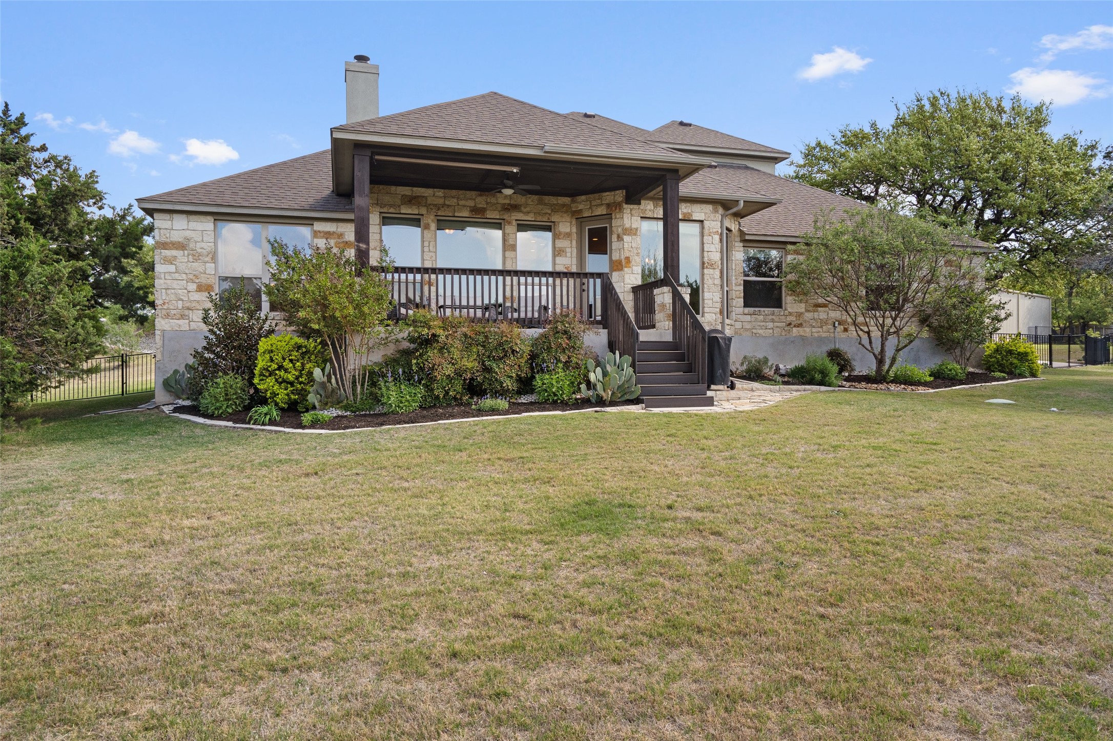 164 Milestone Road Liberty Hill, TX 78642 - Photo 30 of 40 Beautiful view of the thoughtful landscaping in this immaculate yard
