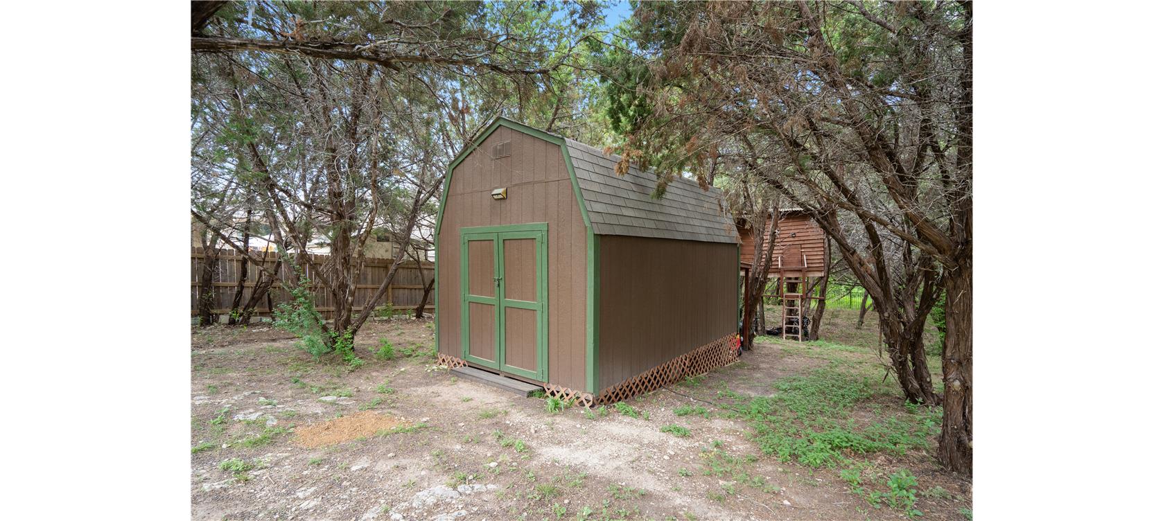 164 Milestone Road Liberty Hill, TX 78642 - Photo 35 of 40 View of large storage shed in the backyard