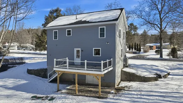 a front view of a house with entertaining space
