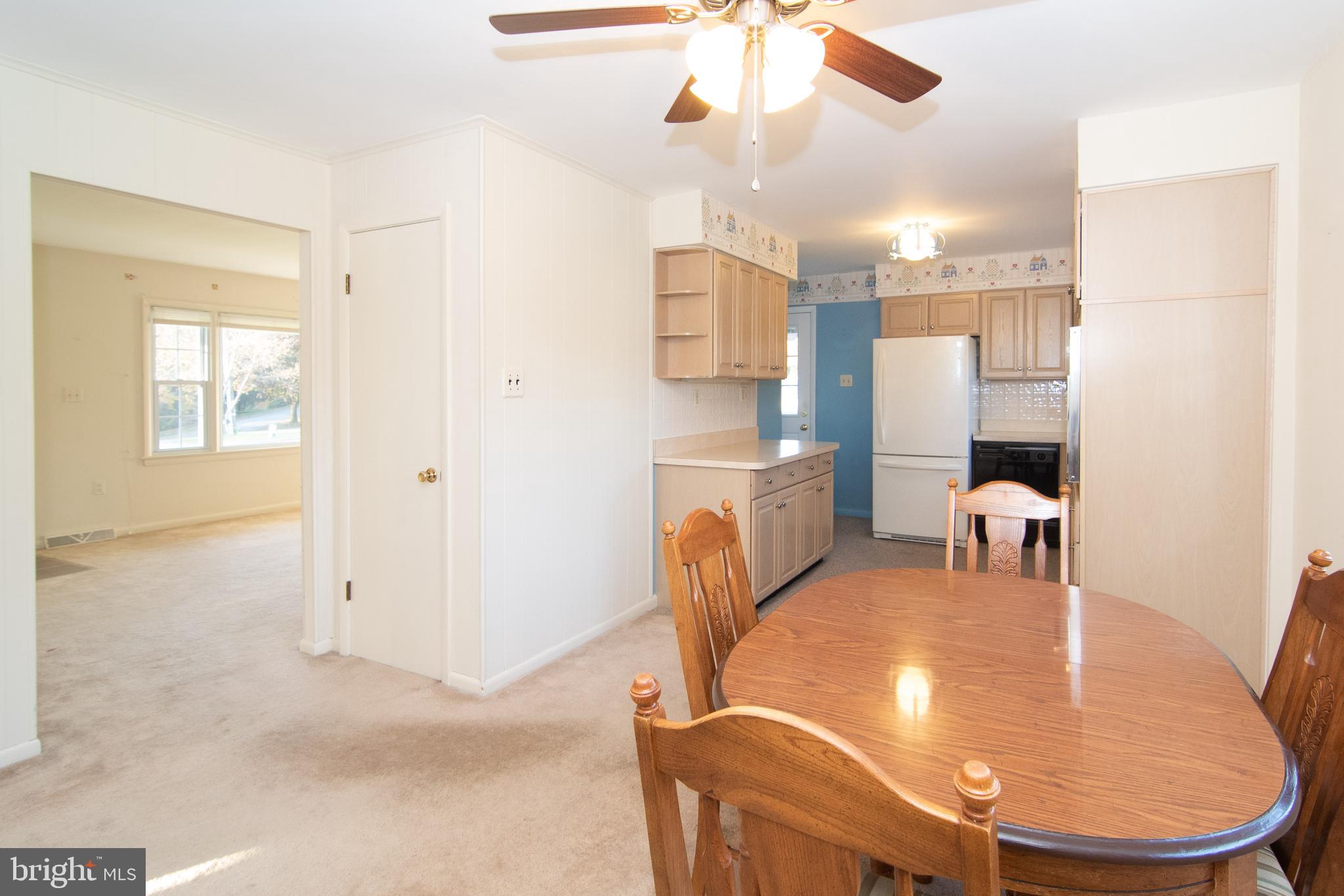 7602 Brooklyn Bridge Road Laurel, MD 20707 - Photo 11 of 36 Dining area opens to living room
