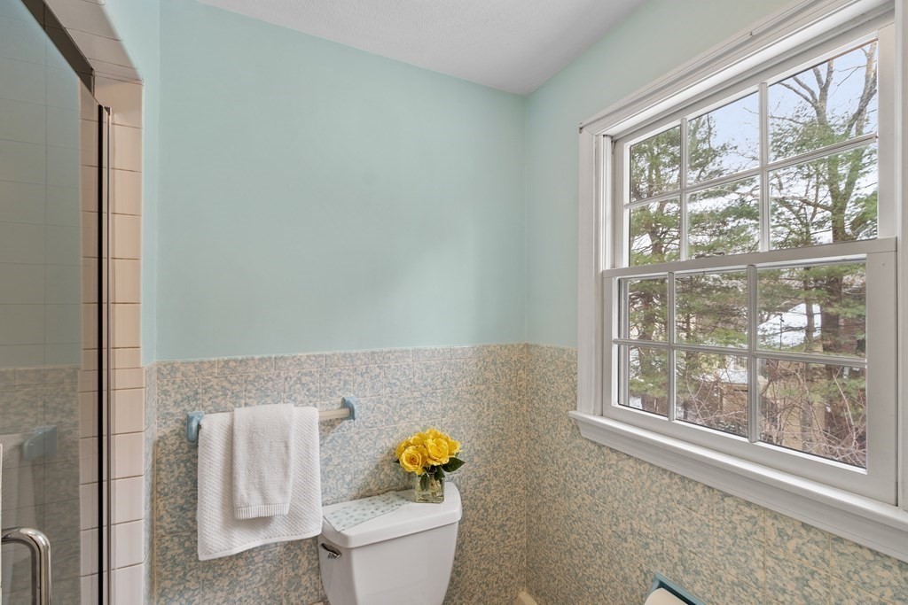 460 Littlefield Road Boxborough, MA 01719 - Photo 16 of 41 a bathroom with a toilet sink and window