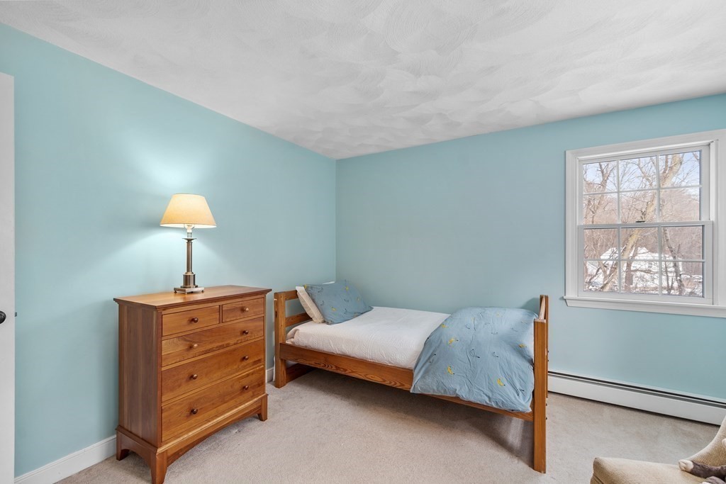 460 Littlefield Road Boxborough, MA 01719 - Photo 20 of 41 a bedroom with a bed and a window