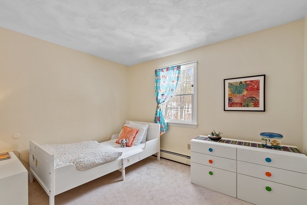 460 Littlefield Road Boxborough, MA 01719 - Photo 21 of 41 a bed room with a bed and a window