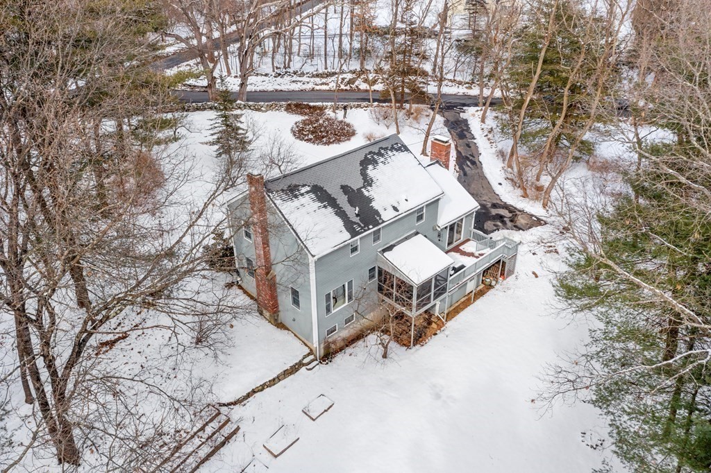 460 Littlefield Road Boxborough, MA 01719 - Photo 33 of 41 a view of a house with yard and covered with snow