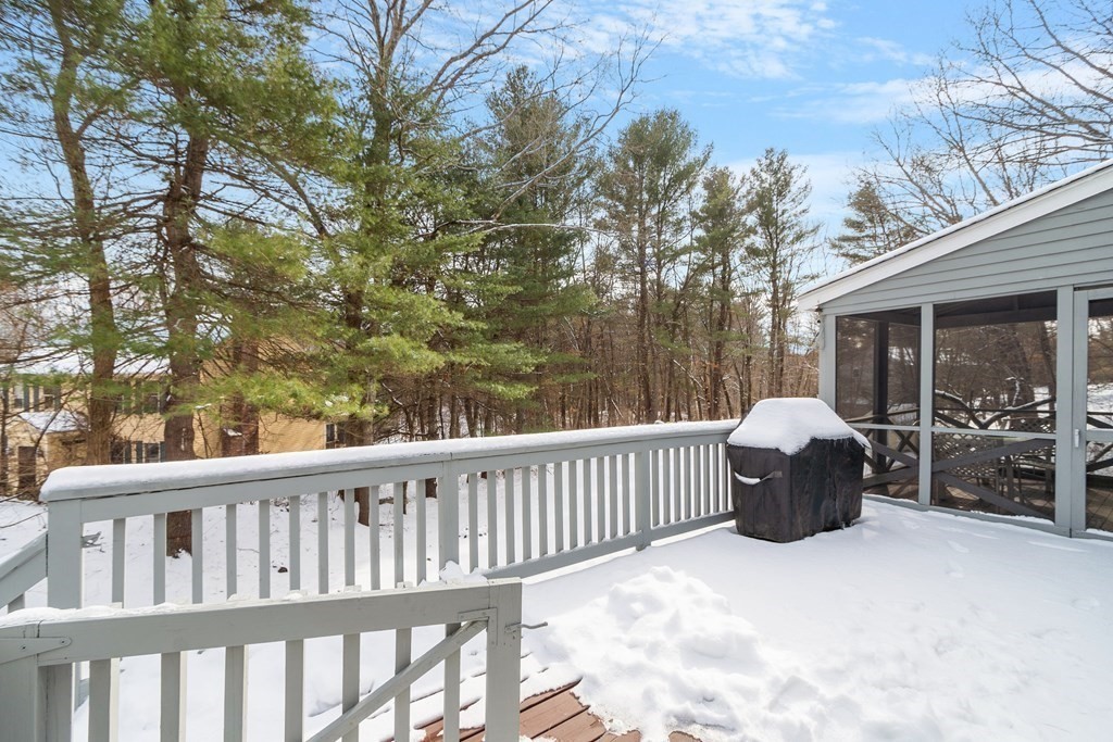 460 Littlefield Road Boxborough, MA 01719 - Photo 34 of 41 a view of a chair and tables in the balcony