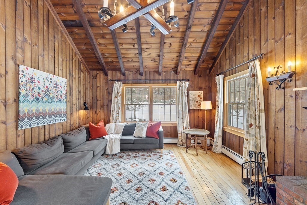 460 Littlefield Road Boxborough, MA 01719 - Photo 10 of 41 a living room with furniture or outdoor space with wooden floor