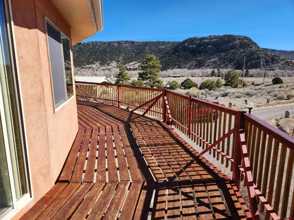 a view of a porch with a yard