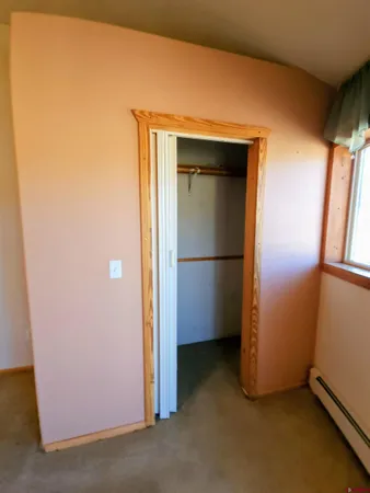 a view of balcony with furniture