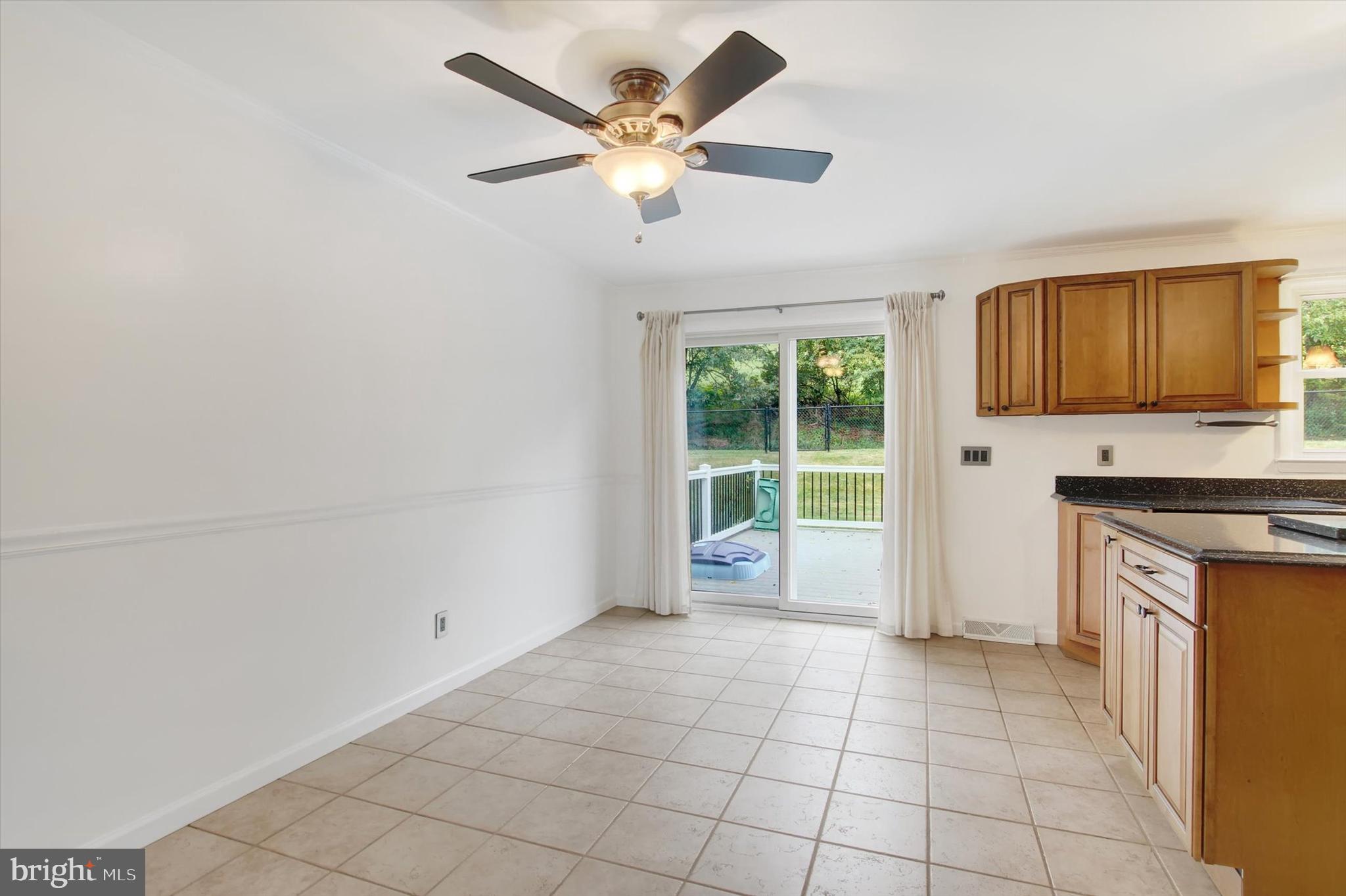 5206 Rockery Road Spring Grove, PA 17362 - Photo 12 of 28 a view of an empty room with window and cabinet