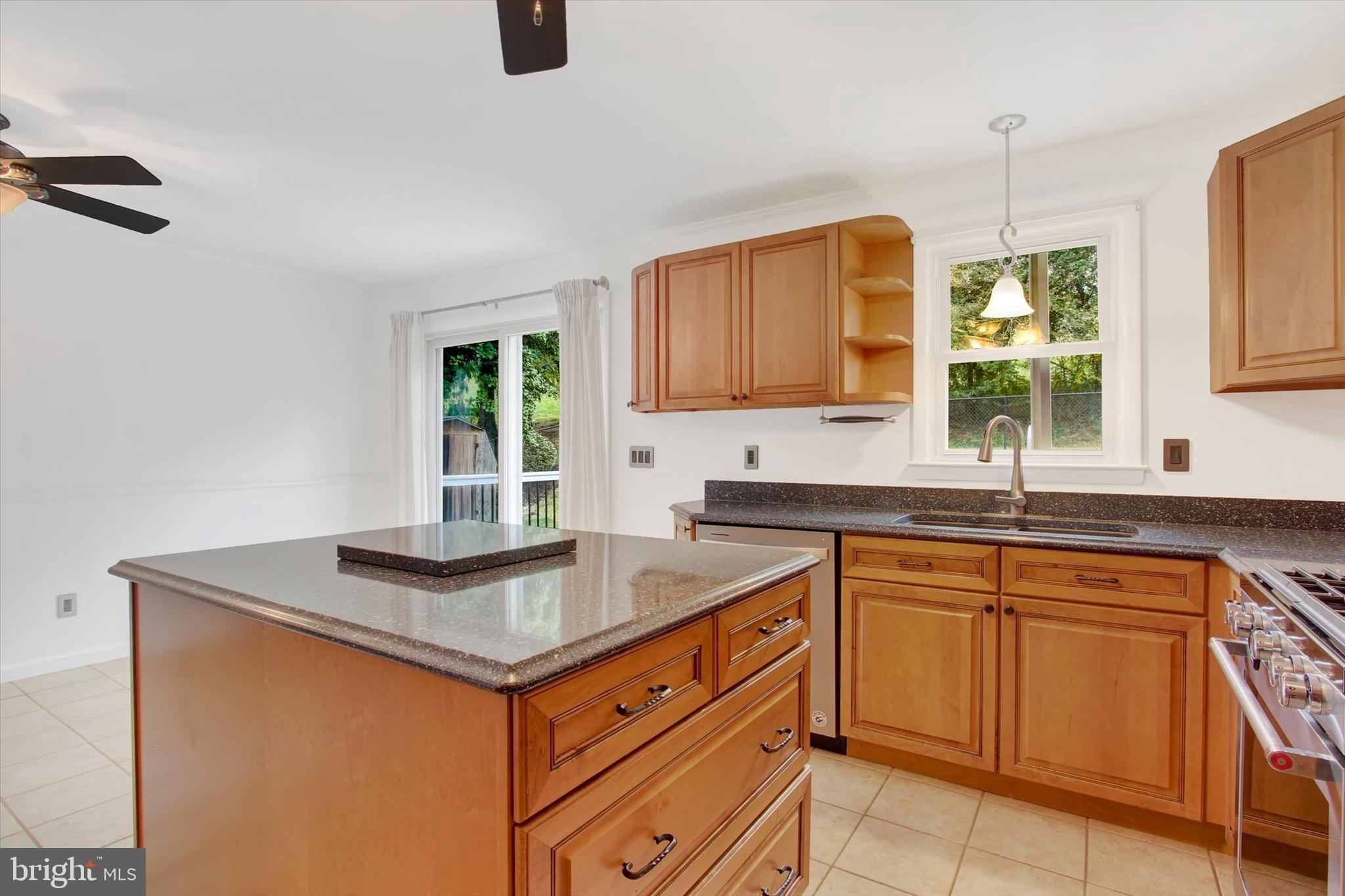 5206 Rockery Road Spring Grove, PA 17362 - Photo 16 of 28 a kitchen with sink cabinets and window