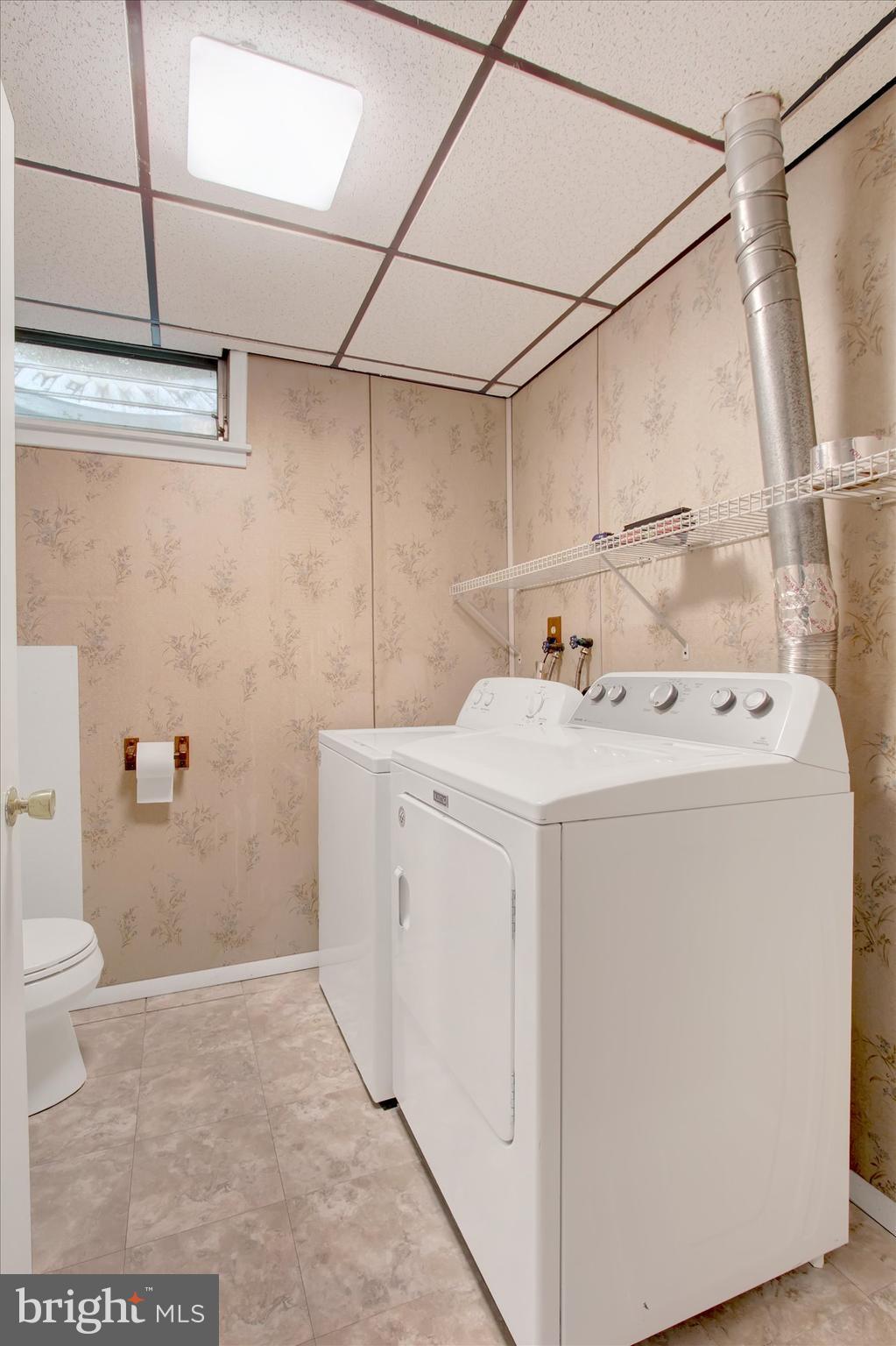 5206 Rockery Road Spring Grove, PA 17362 - Photo 23 of 28 a utility room with dryer and washer