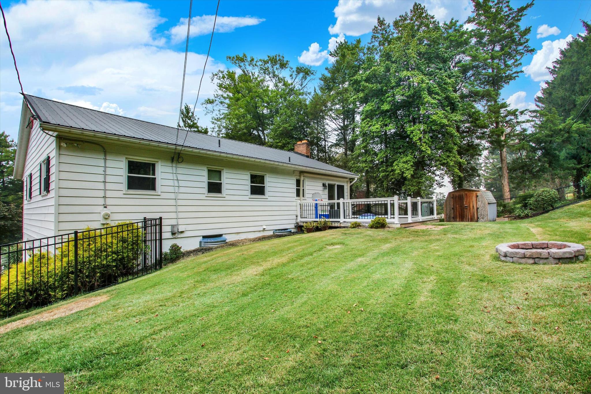 5206 Rockery Road Spring Grove, PA 17362 - Photo 25 of 28 a front view of house with yard and green space