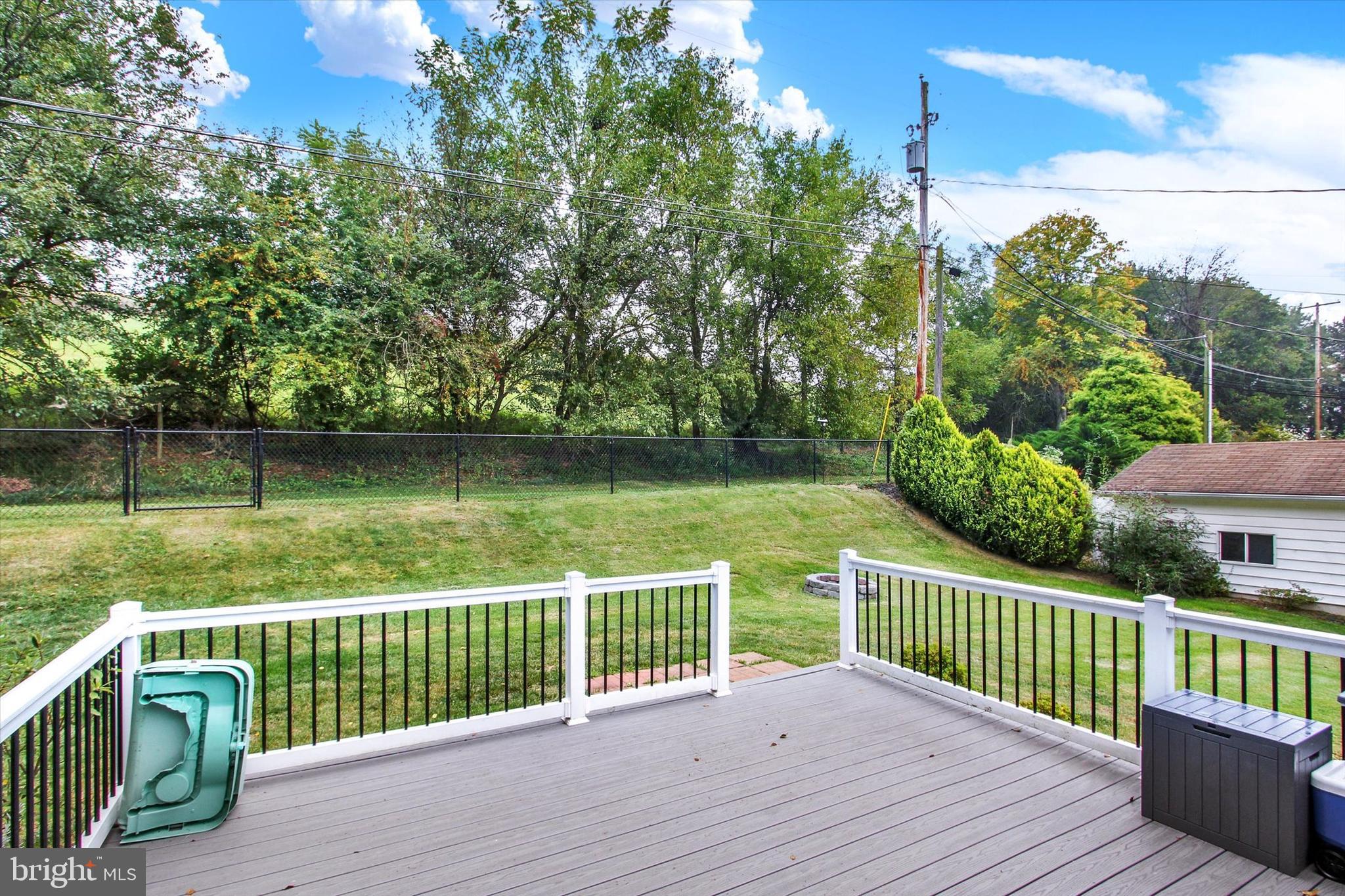 5206 Rockery Road Spring Grove, PA 17362 - Photo 26 of 28 a view of a deck with a yard