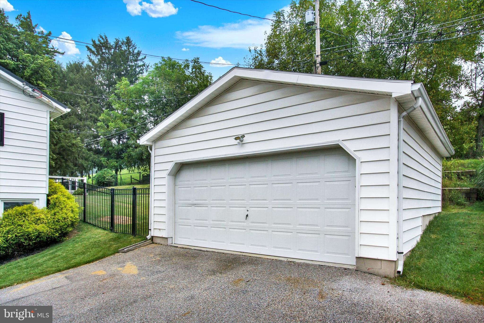 5206 Rockery Road Spring Grove, PA 17362 - Photo 28 of 28 a front view of a house with garage