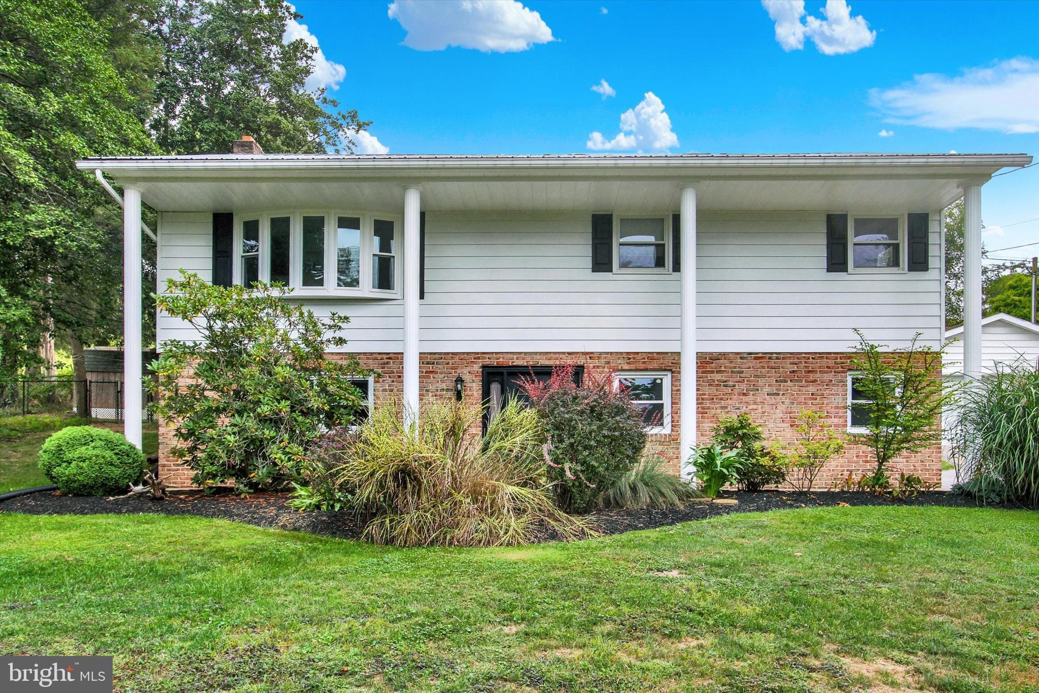 5206 Rockery Road Spring Grove, PA 17362 - Photo 3 of 28 a view of a house with a yard