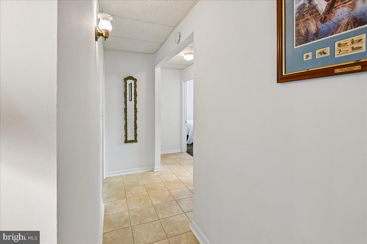 1731 Tacoma Road Edgewater, MD 21037 - Photo 30 of 59 Inviting hallway with natural light.