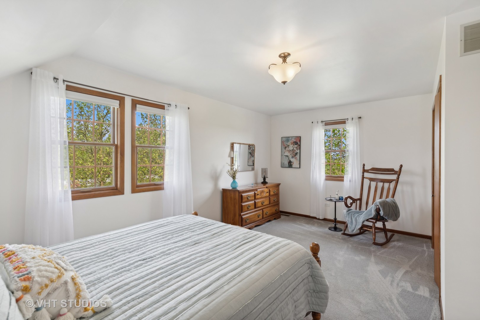 1444 East Corning Road Beecher, IL 60401 - Photo 20 of 33 a bedroom with a bed and a chandelier