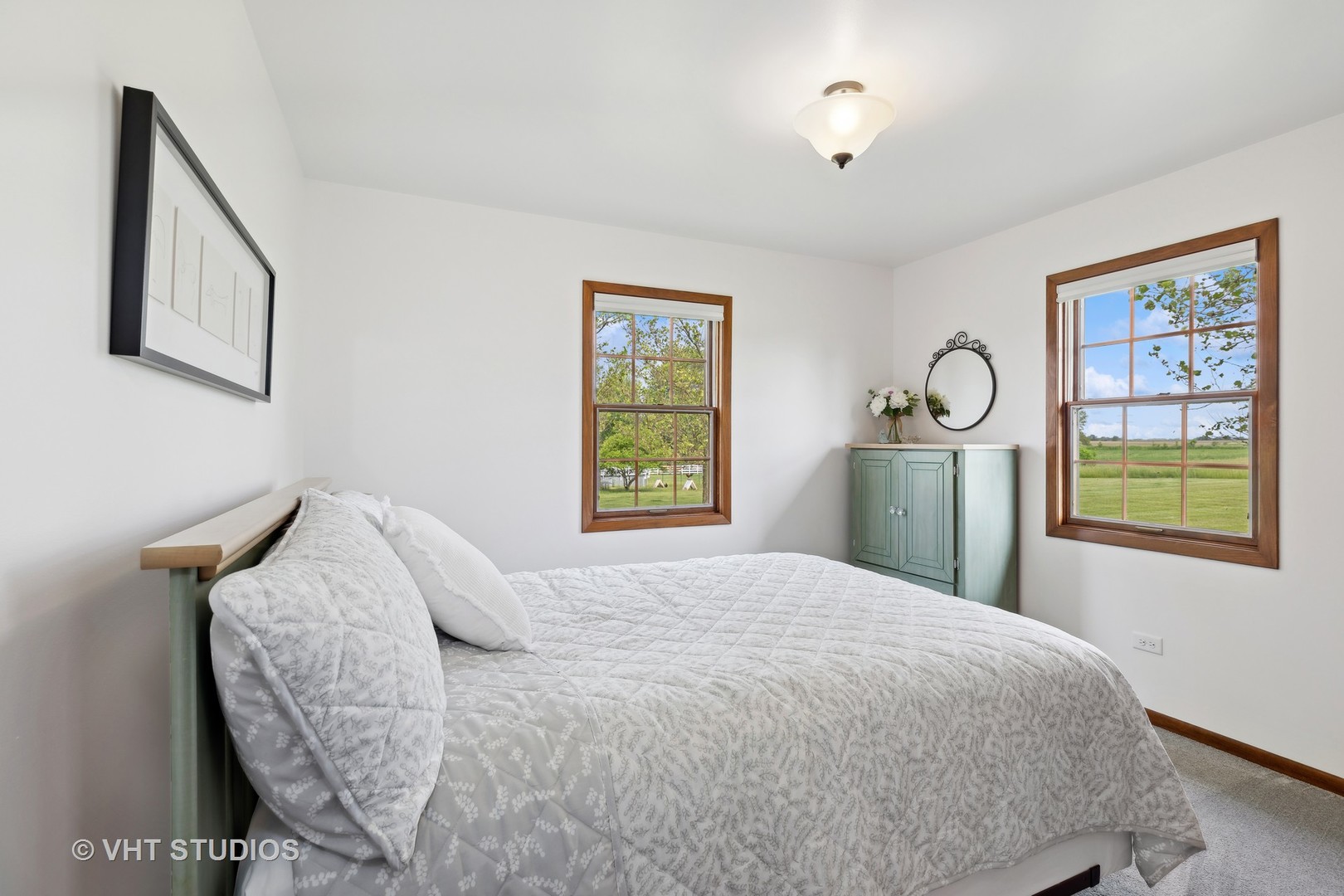 1444 East Corning Road Beecher, IL 60401 - Photo 24 of 33 a bedroom with a bed and window
