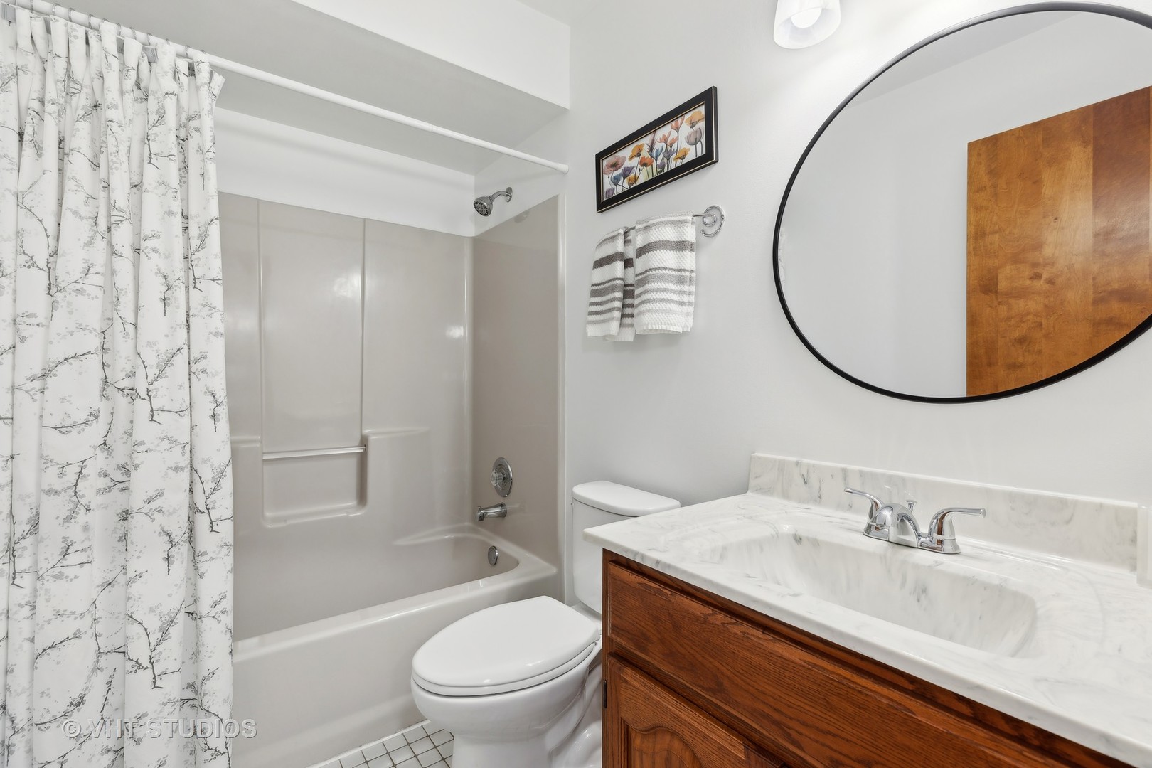 1444 East Corning Road Beecher, IL 60401 - Photo 26 of 33 a bathroom with a granite countertop sink mirror toilet and bathtub