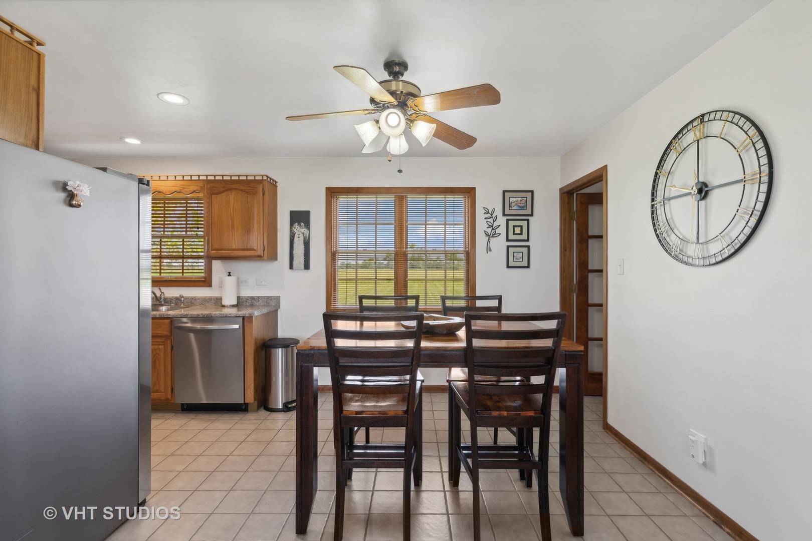 1444 East Corning Road Beecher, IL 60401 - Photo 10 of 33 a view of a dining room with furniture and a chandelier