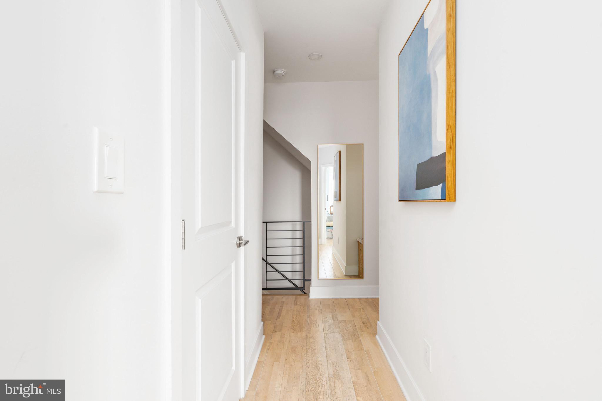 1733 Carpenter Street, Unit D Philadelphia, PA 19146 - Photo 25 of 37 a view of a room with wooden floor