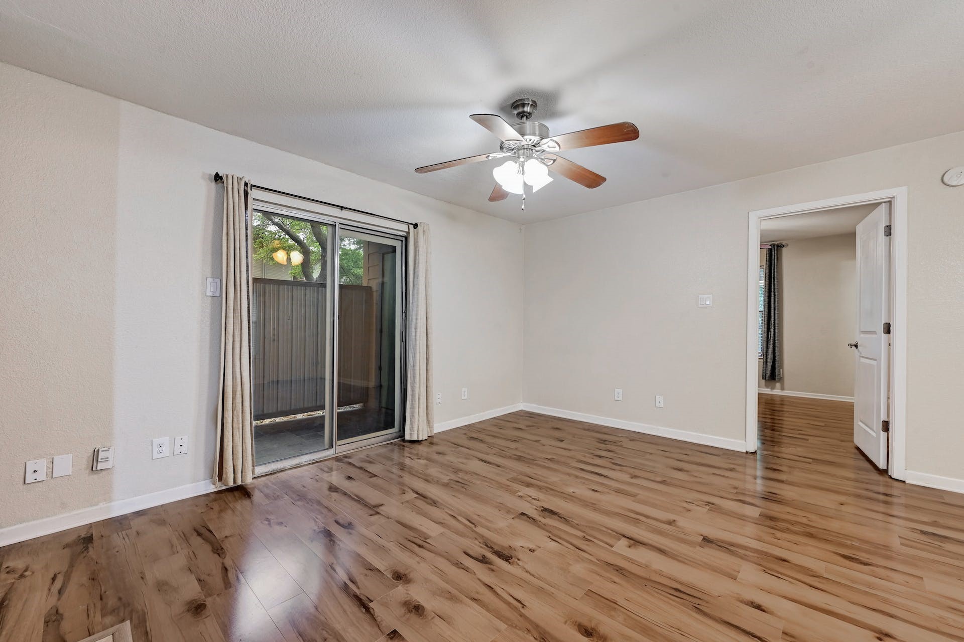 3204 Menchaca Road, Unit 615 Austin, TX 78704 - Photo 8 of 20 Living room and door to patio