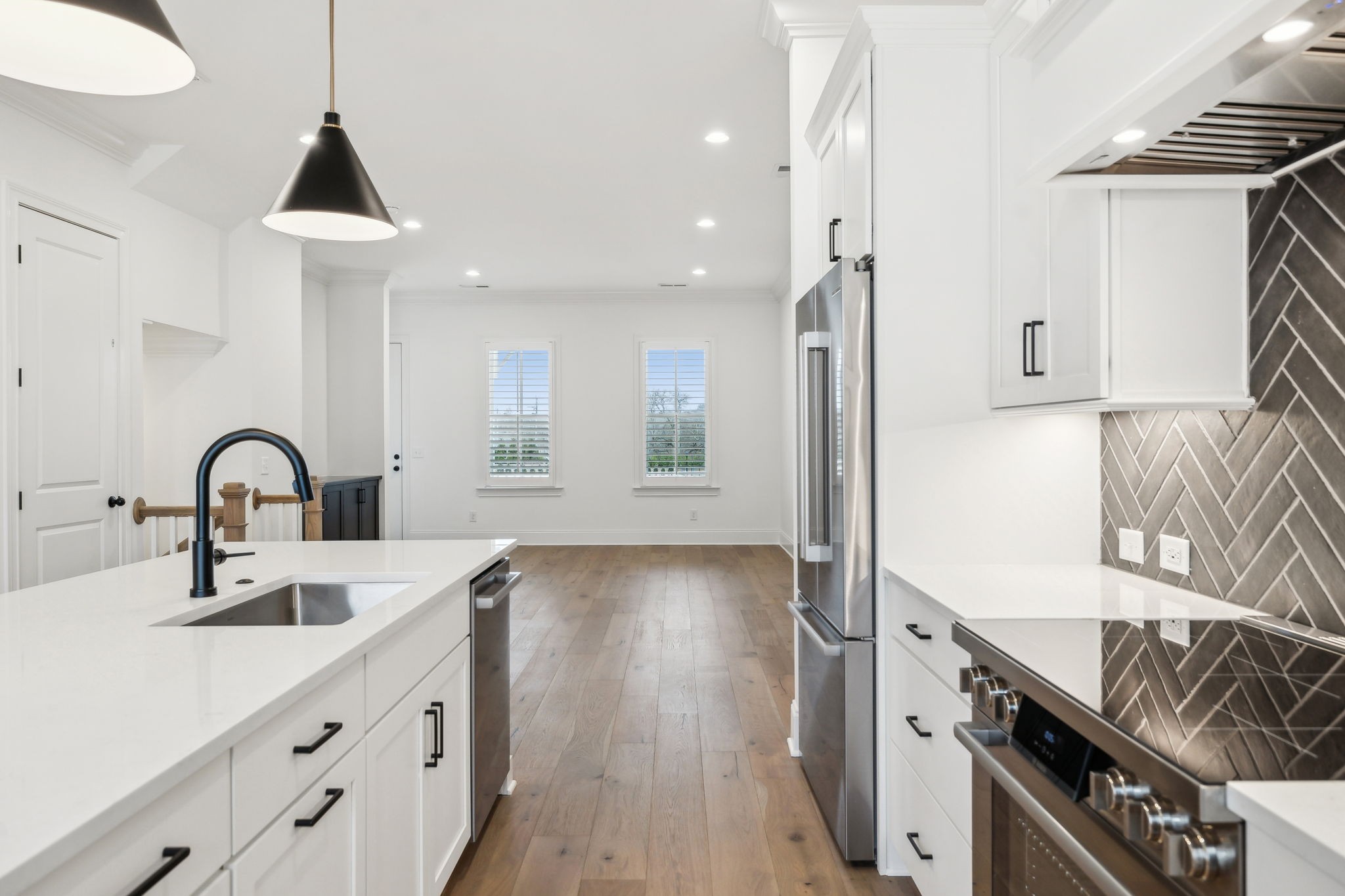 3012 Wynn Circle Franklin, TN 37064 - Photo 17 of 66 a kitchen with stainless steel appliances a sink a stove and a wooden floors