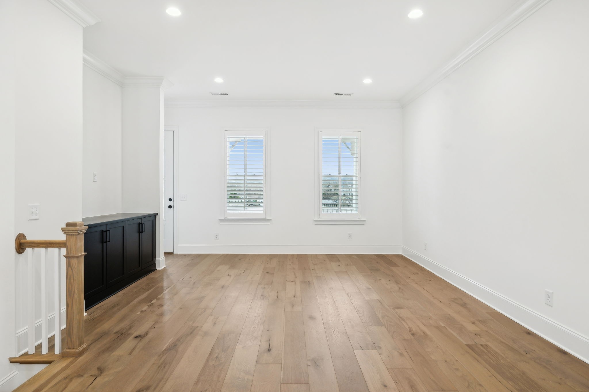 3012 Wynn Circle Franklin, TN 37064 - Photo 25 of 66 an empty room with wooden floor and windows