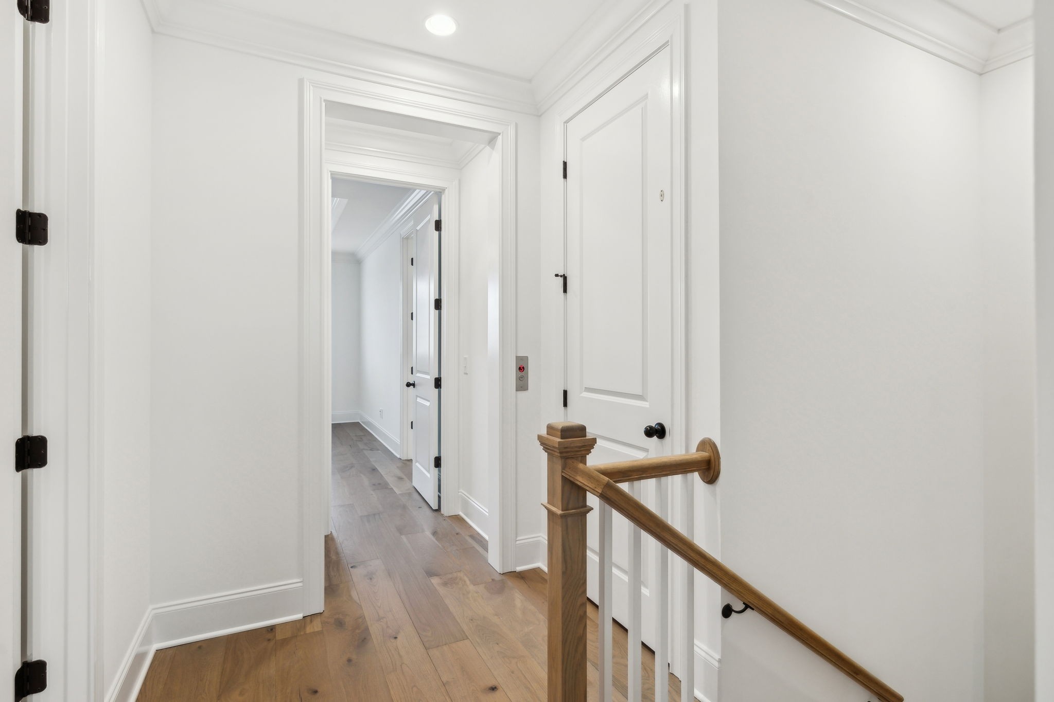 3012 Wynn Circle Franklin, TN 37064 - Photo 30 of 66 a view of a hallway with wooden floor and staircase