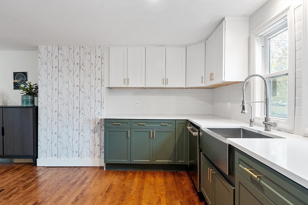 24 Myrtle Avenue Wakefield, MA 01880 - Photo 11 of 39 a kitchen with a sink cabinets and a window
