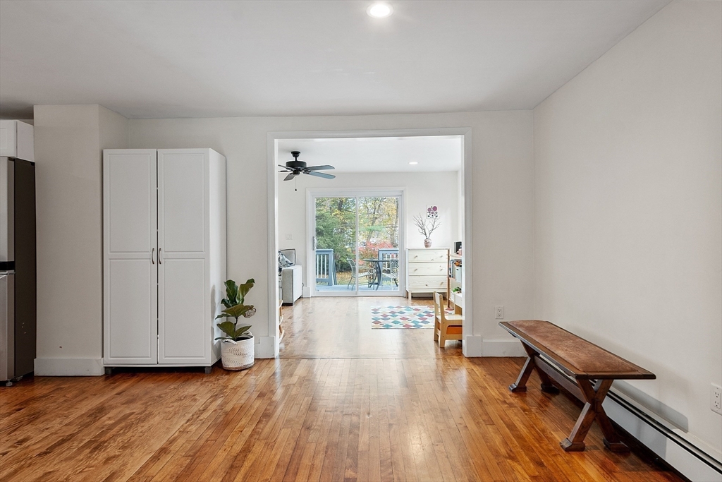 24 Myrtle Avenue Wakefield, MA 01880 - Photo 13 of 39 a furnished livingroom with windows and wooden floor