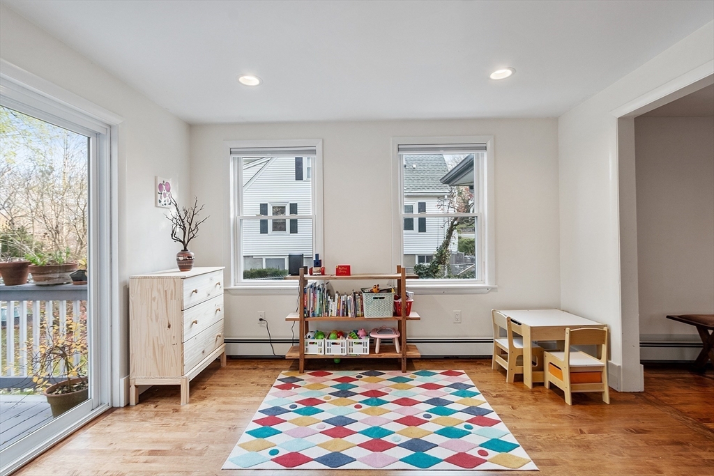 24 Myrtle Avenue Wakefield, MA 01880 - Photo 15 of 39 a bedroom with furniture and a window